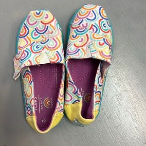 TOMS slip on rainbow shoes